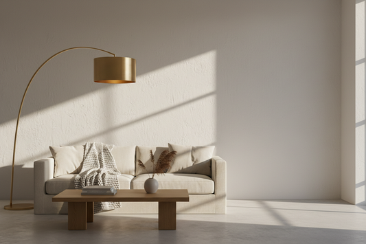 Best floor lamps for living rooms 2026 — brushed brass arc lamp in a minimalist modern living room by RModern